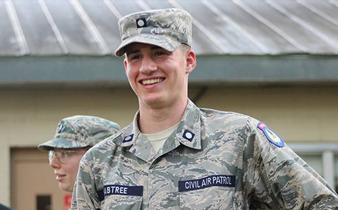 Civil Air Patrol members in utility uniform during a squadron activity